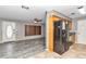 Kitchen with granite countertops, oak cabinets, and black appliances at 5724 Se 2Nd St, Ocala, FL 34480