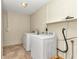 Laundry room features a washer and dryer at 5724 Se 2Nd St, Ocala, FL 34480