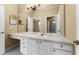 Bathroom boasts a vanity with ample storage and large mirror at 580 Brantley Terrace Way # 203, Altamonte Springs, FL 32714