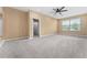 Bright bedroom with neutral walls and carpet flooring at 580 Brantley Terrace Way # 203, Altamonte Springs, FL 32714