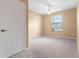 Spacious bedroom with ceiling fan and large window at 580 Brantley Terrace Way # 203, Altamonte Springs, FL 32714