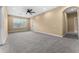 Spacious living room with carpet and ceiling fan at 580 Brantley Terrace Way # 203, Altamonte Springs, FL 32714
