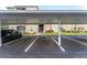 Covered parking spot with additional parking spaces and building access at 580 Brantley Terrace Way # 203, Altamonte Springs, FL 32714