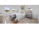 Bright bedroom with plush bedding and a view at 6491 Octave St, Mascotte, FL 34753