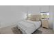 Spacious bedroom with comfortable bedding and nightstands at 6491 Octave St, Mascotte, FL 34753