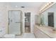 Bathroom with shower, double vanity, and updated fixtures at 104 Coventry Ln, Haines City, FL 33844