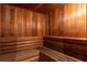 Relaxing wooden sauna with built-in benches at 104 Coventry Ln, Haines City, FL 33844
