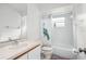 Bathroom with marble-look tile and bathtub at 112 Blackwater Ct, Kissimmee, FL 34743
