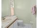 Small bathroom with single sink vanity and toilet at 112 Blackwater Ct, Kissimmee, FL 34743