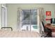 Bedroom with pool view and sliding glass doors at 112 Blackwater Ct, Kissimmee, FL 34743