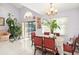Spacious dining area with access to a patio and pool at 112 Blackwater Ct, Kissimmee, FL 34743