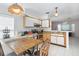 Open kitchen with ample counter space and a breakfast bar at 112 Blackwater Ct, Kissimmee, FL 34743