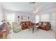 Living room with leather sofas, arm chair and coffee table at 112 Blackwater Ct, Kissimmee, FL 34743