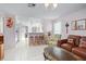 Open living area with kitchen and breakfast bar visible at 112 Blackwater Ct, Kissimmee, FL 34743