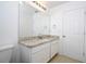 Clean bathroom with granite countertop and a toilet at 1798 Flourish Ave, Kissimmee, FL 34744