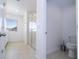Simple bathroom with toilet and shower at 1798 Flourish Ave, Kissimmee, FL 34744