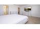Main bedroom with large TV and ample closet space at 1798 Flourish Ave, Kissimmee, FL 34744