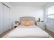Charming bedroom with a queen bed and ample closet space at 1798 Flourish Ave, Kissimmee, FL 34744
