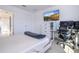 Bedroom with large TV and built in desk at 1798 Flourish Ave, Kissimmee, FL 34744