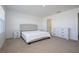 Main bedroom with ensuite bathroom and window at 1798 Flourish Ave, Kissimmee, FL 34744