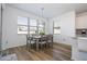Dining area with table and chairs near kitchen at 1798 Flourish Ave, Kissimmee, FL 34744