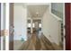 Bright and spacious entryway with wood-look floors, leading to living areas at 1798 Flourish Ave, Kissimmee, FL 34744