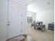 Home office with a desk, chair, and built-in shelving at 1798 Flourish Ave, Kissimmee, FL 34744