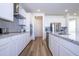 Bright kitchen featuring white cabinets and granite countertops at 1798 Flourish Ave, Kissimmee, FL 34744