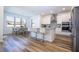 Modern kitchen with stainless steel appliances and island at 1798 Flourish Ave, Kissimmee, FL 34744