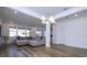 Bright living room with hardwood floors and a spacious sectional sofa at 1798 Flourish Ave, Kissimmee, FL 34744