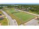 Aerial view of community with sports fields at 218 Brooke'S Pl, Haines City, FL 33844