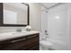 Bathroom with vanity, toilet, and shower/tub combo at 218 Brooke'S Pl, Haines City, FL 33844