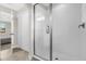Clean bathroom with a glass shower door and modern tile at 218 Brooke'S Pl, Haines City, FL 33844