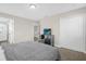 King-size bed and dresser in a bright bedroom at 218 Brooke'S Pl, Haines City, FL 33844