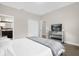 Bright bedroom with a plush bed and mirrored furniture at 218 Brooke'S Pl, Haines City, FL 33844