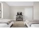 Bedroom with two twin beds, dresser, and TV at 218 Brooke'S Pl, Haines City, FL 33844