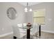 Dining room with glass table and white chairs at 218 Brooke'S Pl, Haines City, FL 33844