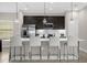 Modern kitchen with stainless steel appliances and an island with seating at 218 Brooke'S Pl, Haines City, FL 33844