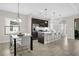 Open concept kitchen with breakfast bar and dining area at 218 Brooke'S Pl, Haines City, FL 33844