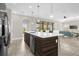 Modern kitchen with large island and stainless steel appliances at 218 Brooke'S Pl, Haines City, FL 33844