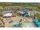 Aerial view of water park with slides and play area at 218 Brooke'S Pl, Haines City, FL 33844
