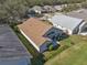 Aerial view shows house layout and surrounding neighborhood at 24946 Cranes Roost Circle, Leesburg, FL 34748