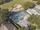 Aerial view of community pool and golf course at 24946 Cranes Roost Circle, Leesburg, FL 34748