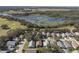 Aerial view of homes near lake and golf course at 24946 Cranes Roost Circle, Leesburg, FL 34748