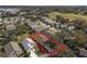 Aerial view of house and surrounding neighborhood at 24946 Cranes Roost Circle, Leesburg, FL 34748