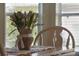 Small kitchen table with burlap wrapped flower centerpiece at 24946 Cranes Roost Circle, Leesburg, FL 34748