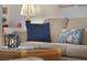 Living room detail showing sofa with throw pillows at 24946 Cranes Roost Circle, Leesburg, FL 34748