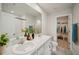 Clean bathroom with double vanity and walk-in closet at 251 Blueberry Ln, Davenport, FL 33837