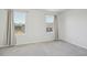 Bright bedroom with neutral walls and carpet at 251 Blueberry Ln, Davenport, FL 33837