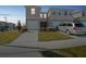 Two-story townhouse with driveway and garage at 251 Blueberry Ln, Davenport, FL 33837
